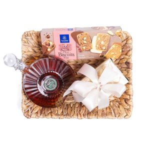 Καλάθι με λικέρ φουντούκι “ΠΟΛΥΚΑΛΑ” , κουτί με 500γρ σοκολατάκια και 1 πακέτο μπισκότα Leonidas